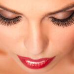 Young slim woman enjoys weight loss result