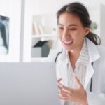 Young slim woman enjoys weight loss result