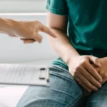 Young slim woman enjoys weight loss result