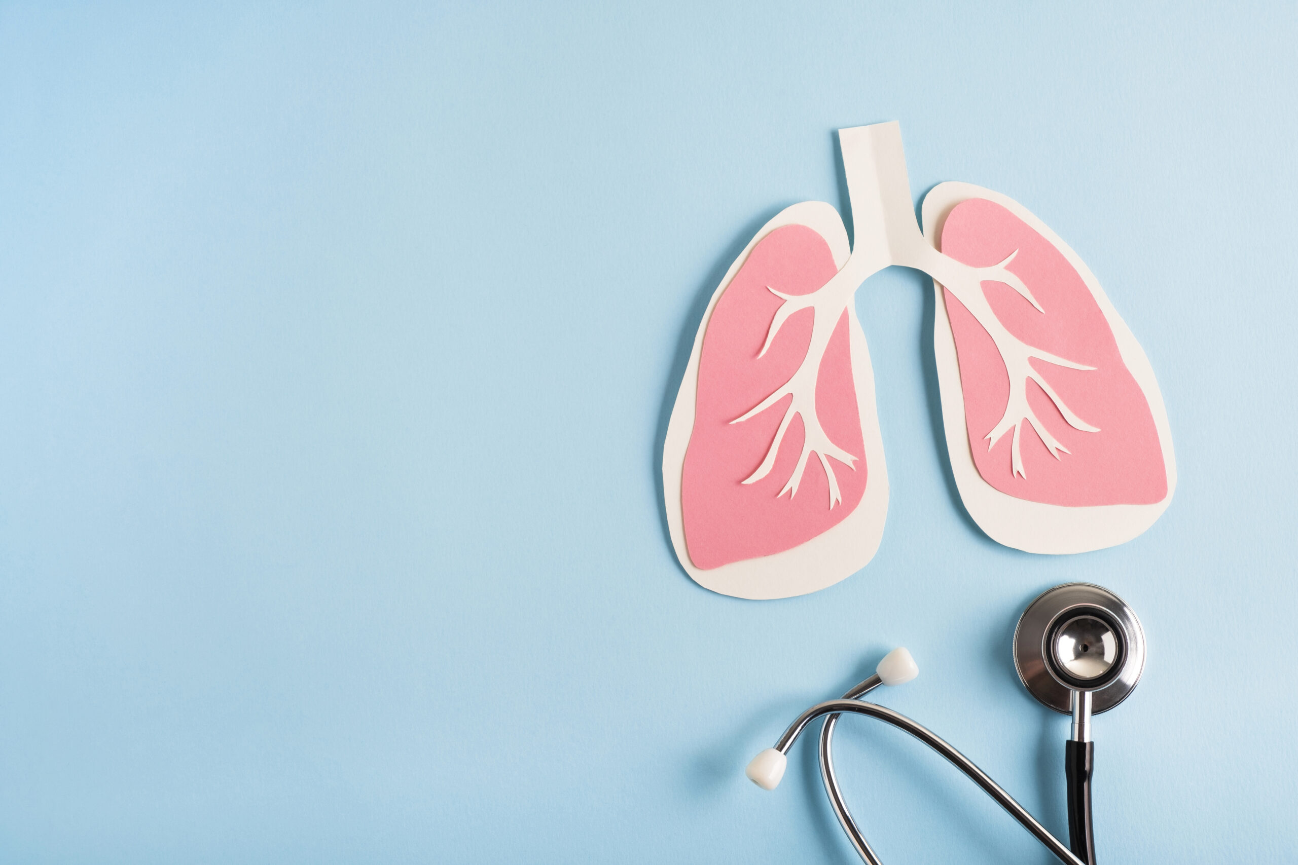 Depiction of human lungs and a stethoscope.