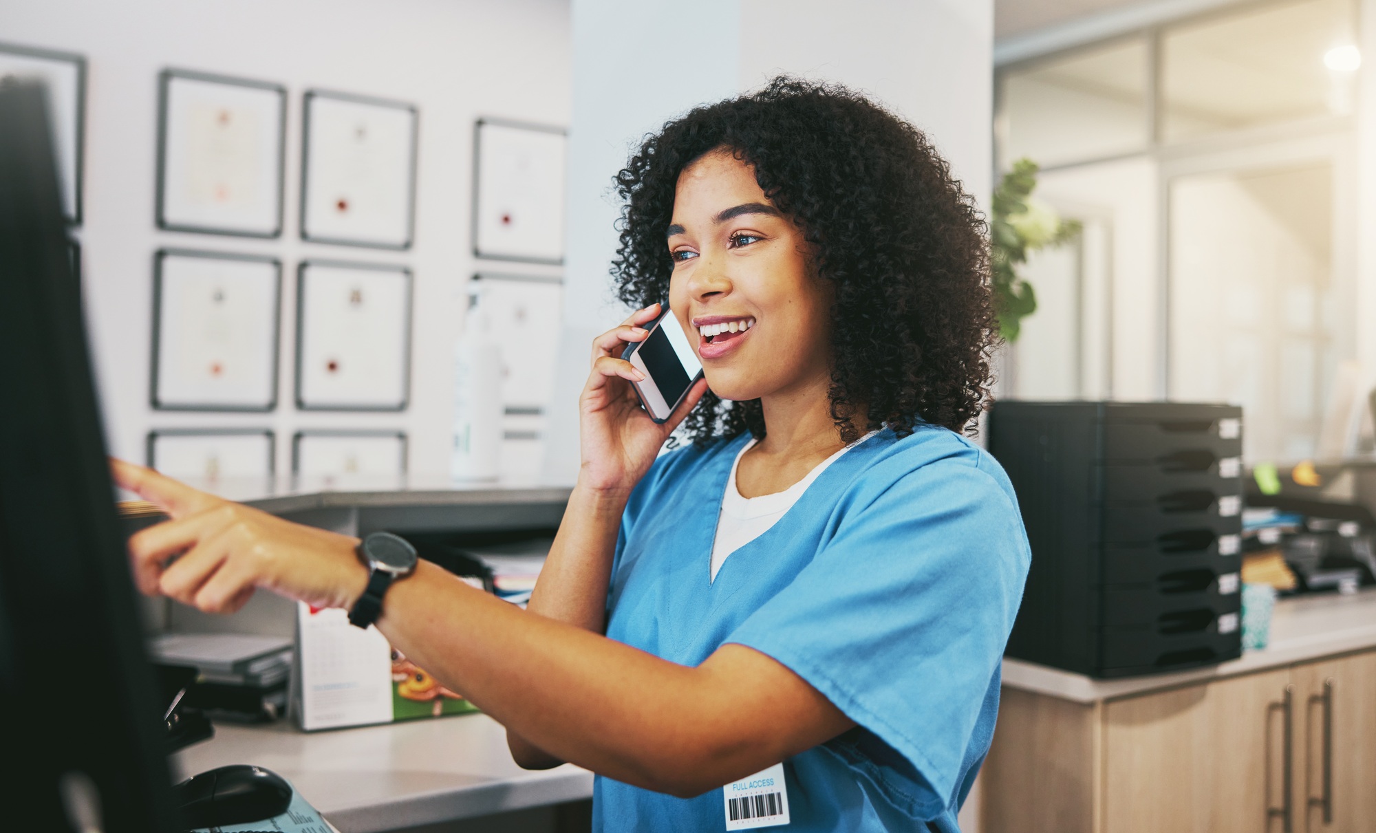Phone call, nurse and black woman with computer in hospital for healthcare or telehealth. Medical,